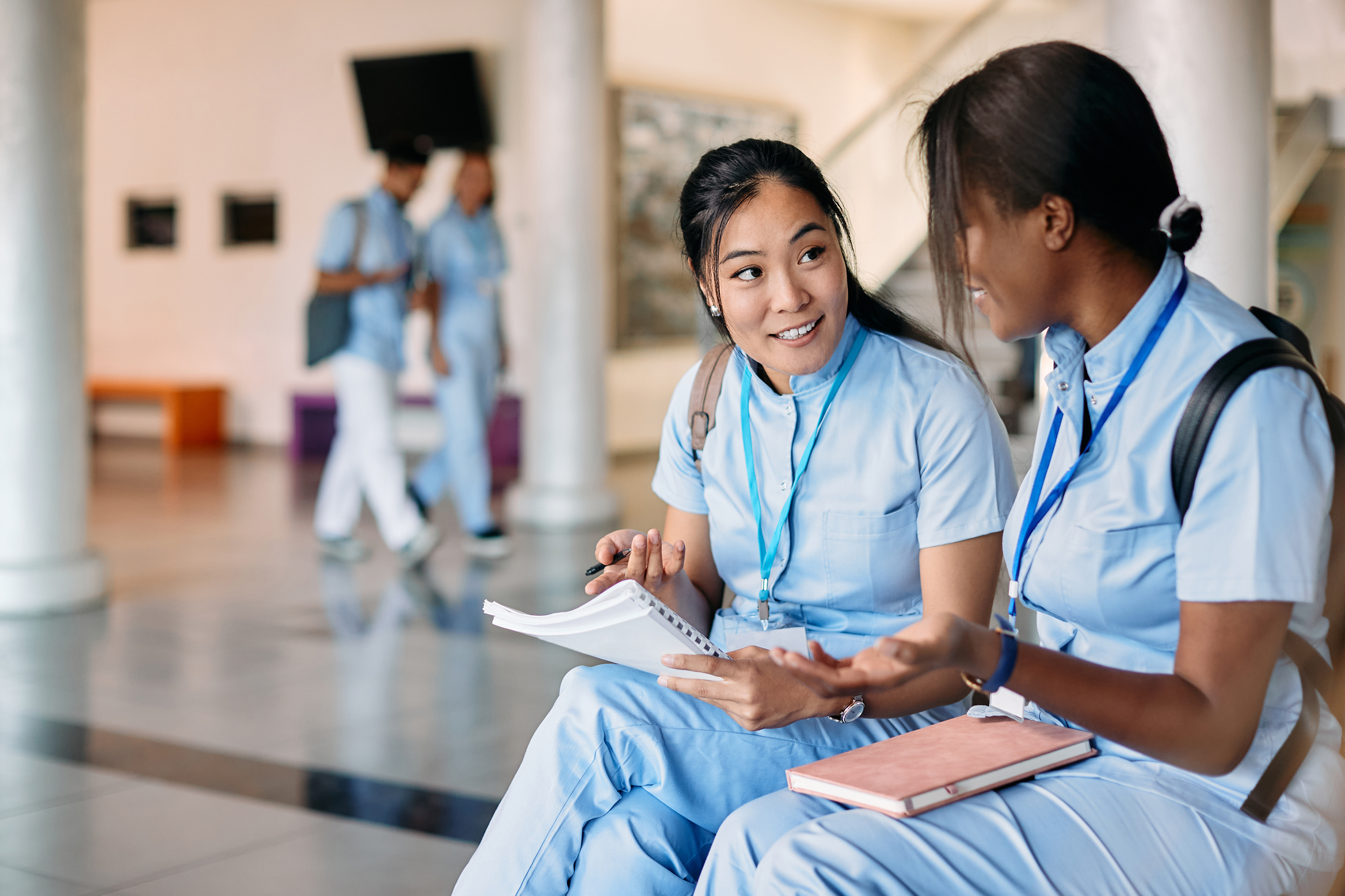 Two nurses talking